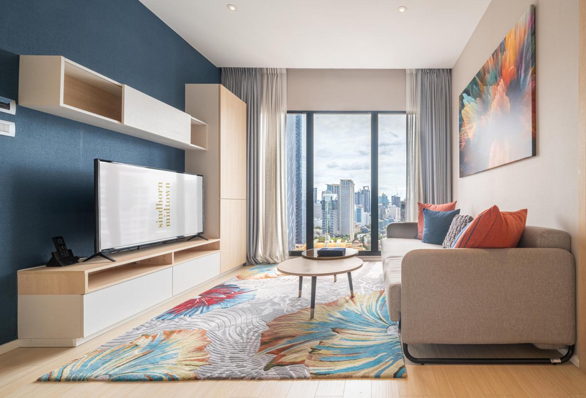 Sindhorn Midtown Hotel Bangkok, Vignette Collection By Ihg Exterior photo A living room in a serviced apartment in Kuala Lumpur, Malaysia