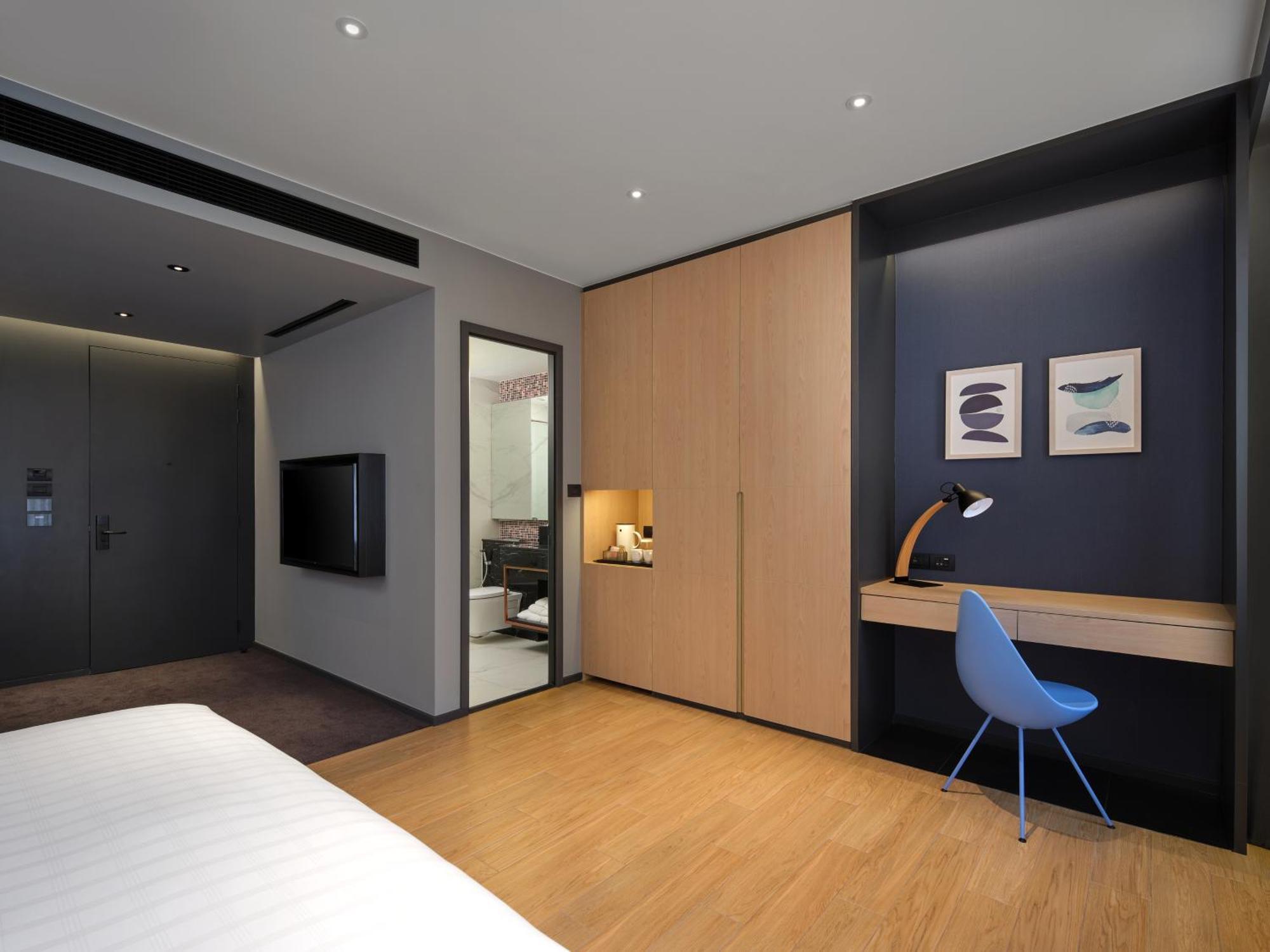 Sindhorn Midtown Hotel Bangkok, Vignette Collection By Ihg Exterior photo A bedroom at the hotel